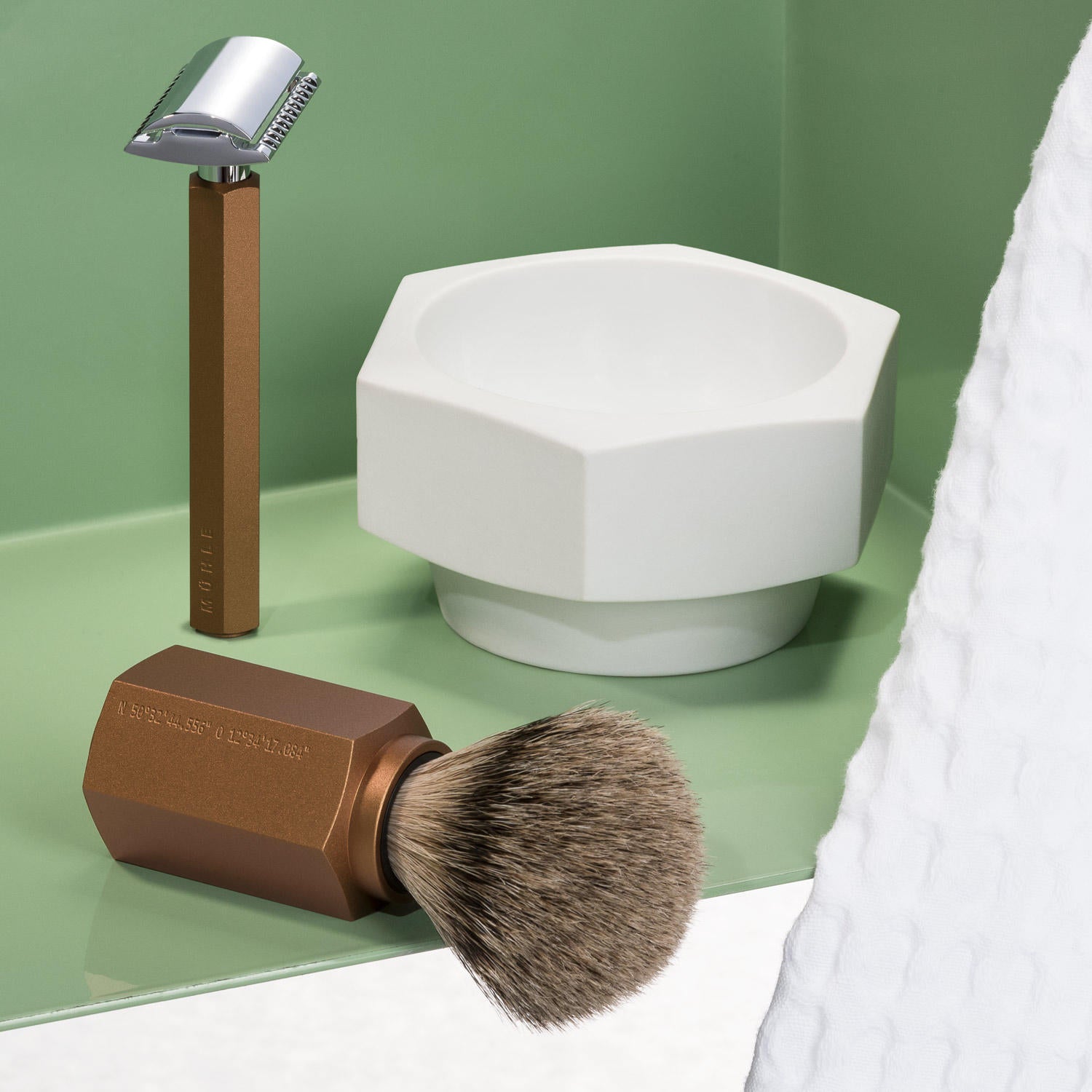MÜHLE Hexagon White Porcelain Shaving Bowl pictured with Razor and Brush